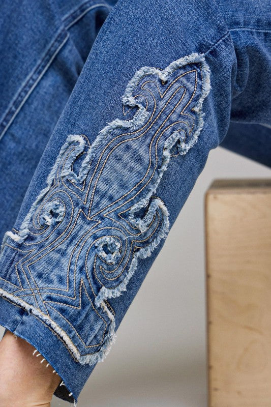 Hidden Charm Appliqué Flare Jeans
